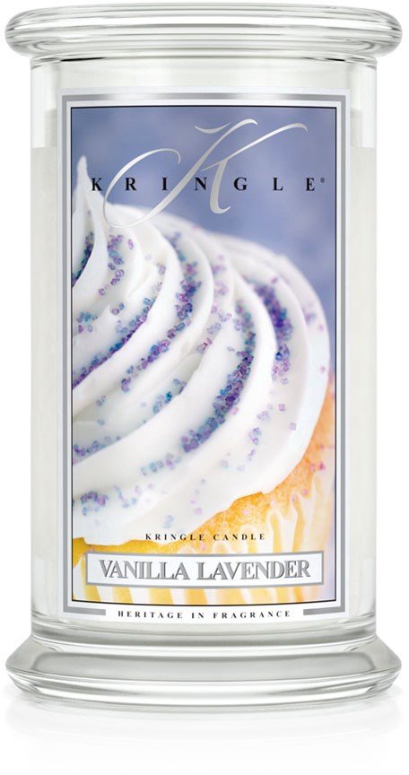 Ett tydligt ljusglas med doften vanilj lavendel, med en vit virvlande design och lila strössel på etiketten.