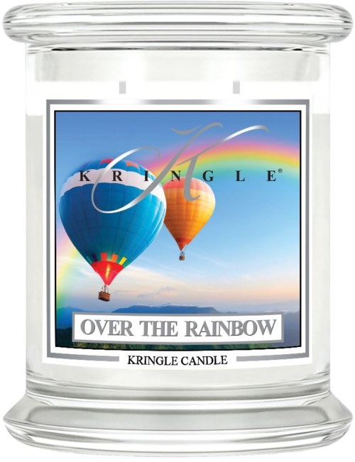 En genomskinlig ljuslykta med en etikett som visar varmluftsballonger, en regnbåge och orden "Over the Rainbow".