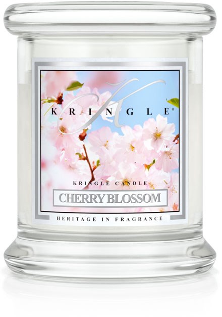 Ett glasljus med cherry blossom-design och texten "KRIKLE CHERRY BLOSSOM."