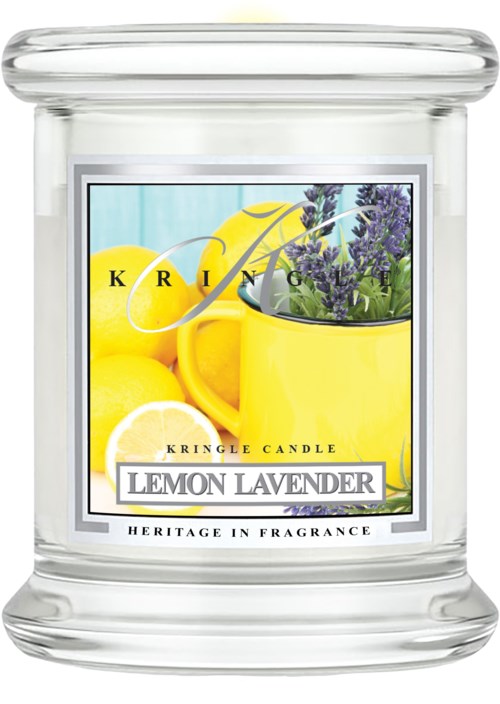 Ett doftljus med citron och lavendel, i en klar glasskopp med en etikett som visar citron, lavendelblommor och texten.