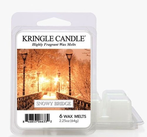 A candle wax melt package labeled 'Kringle Candle Snowy Bridge' with an image of a winter bridge scene at sunset.