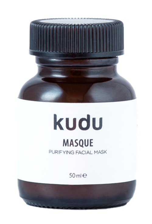 En liten brun burk med svart lock, märkt 'kudu Masque', för ansiktsvård, 50 ml.