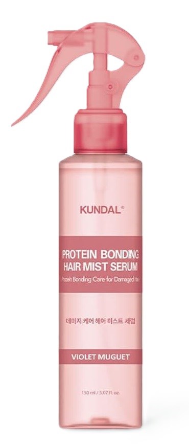 A pink spray bottle labeled 'KUNDAL' for hair mist, mentioning protein bonding and violet muguet scent, 150ml.