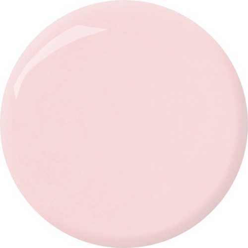 En blød rosa rund genstand med en reflekterende del.