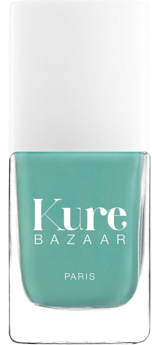En flaske med grøn neglelak med hvid låg, med mærket 'Kure Bazaar Paris' på forsiden.