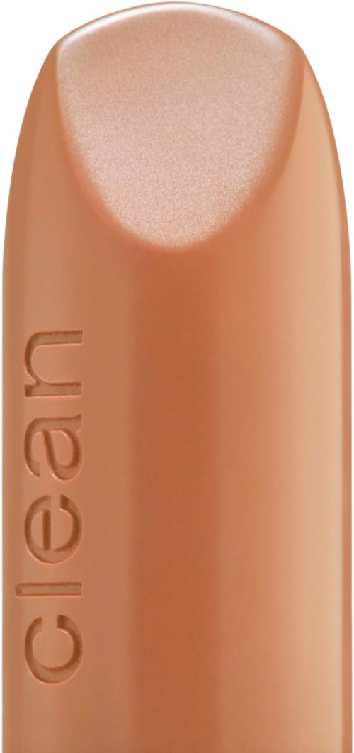 En beige makeup-sticka med texten "Clé de Peau" ingraverat på den.