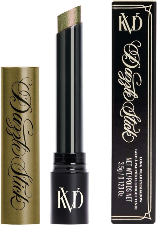 Lippenstift mit goldener und schwarzer Verpackung, Kappe in der Nähe und Text auf der Verpackung.