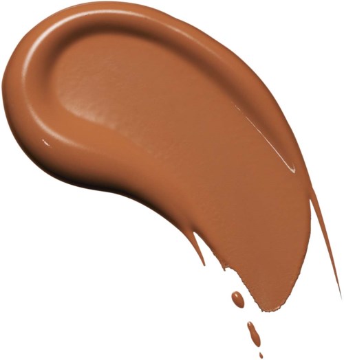 A smear of light brown or beige makeup or foundation with two small drops at the end.