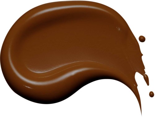En skjeformet mengde smeltet sjokolade med en liten dråpe på høyre side.