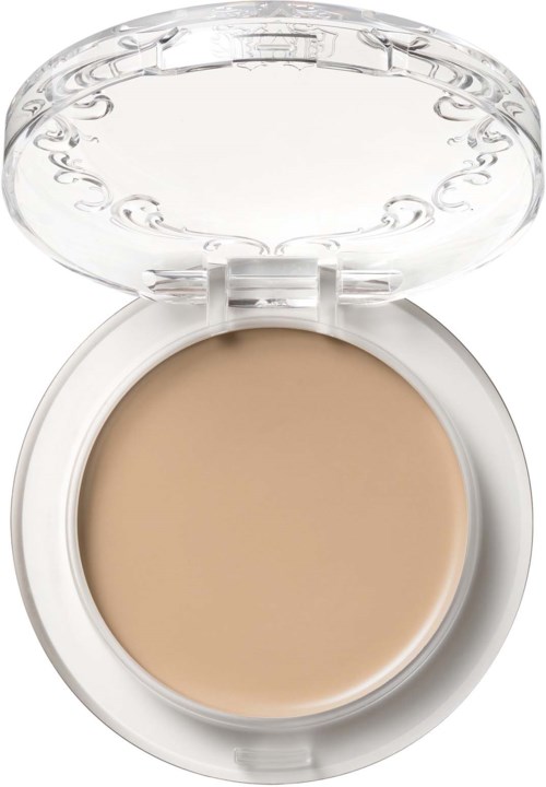 En liten förpackning med beige makeup, klar lock och enkel design, sannolikt för ansikte eller hudanvändning.