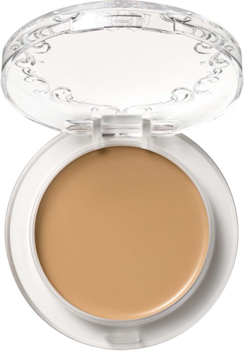 En kompaktpuderförpackning med ett klart lock, som visar beige puder inuti.