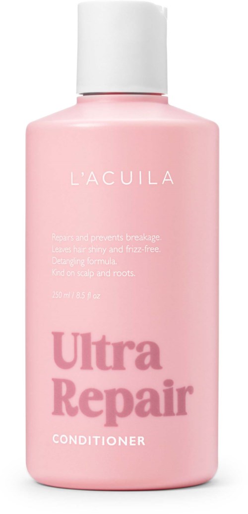 En lyserød flaske med L'Acuila Ultra Repair Conditioner med hvid hætte og enkel etikette.