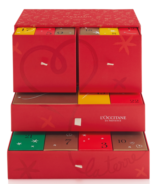 En festlig adventskalender med numrerade dörrar, dekorerad i rött med julsymboler och varumärkeslogga L'Occitane.