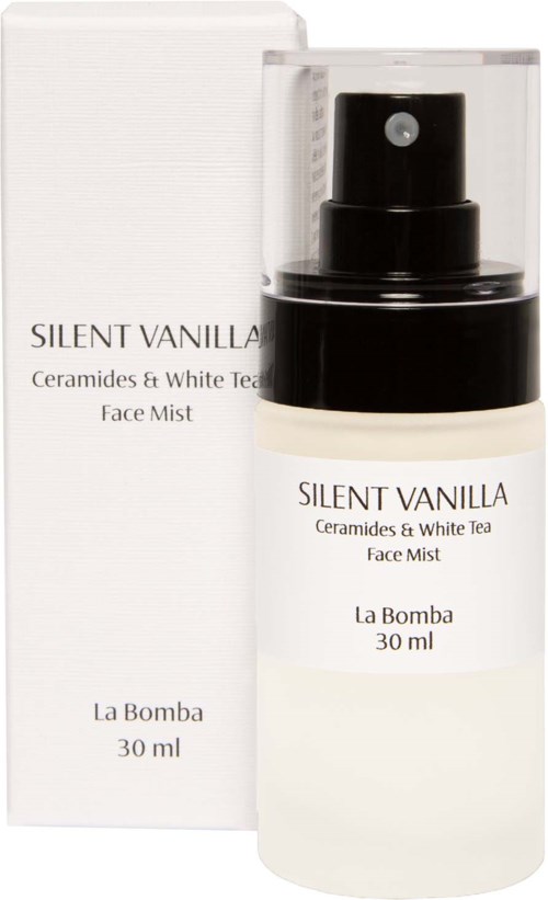 Biały butelka i pudełko z czarnym rozpylaczem, oznaczone jako Face Mist Silent Vanilla, 30 ml.