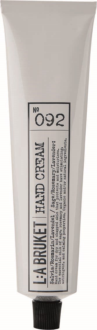 En vit tub med svart lock märkt 'L'ABRUET' och 'HAID CREAM'. Den har ett produktsnummer 092.