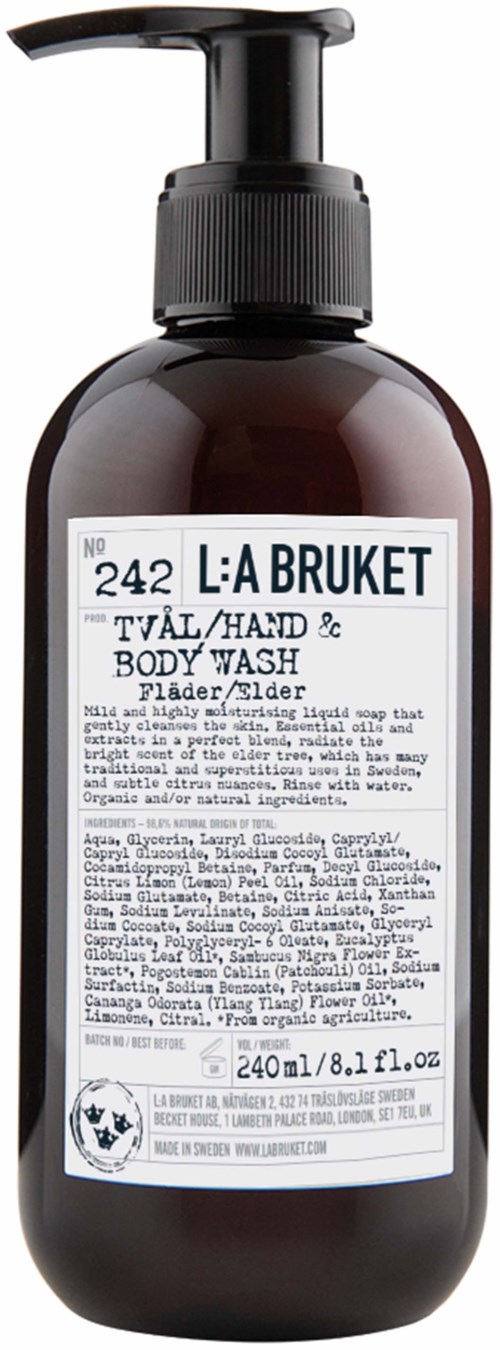 A dark bottle with a pump, labeled L:A Bruket, contains hand and body wash for shower or bath use.