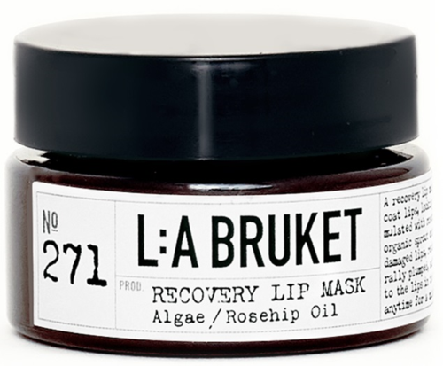 A small jar labeled 'L:A BRUKET' contains Recovery Lip Mask with algae and rosehip oil.