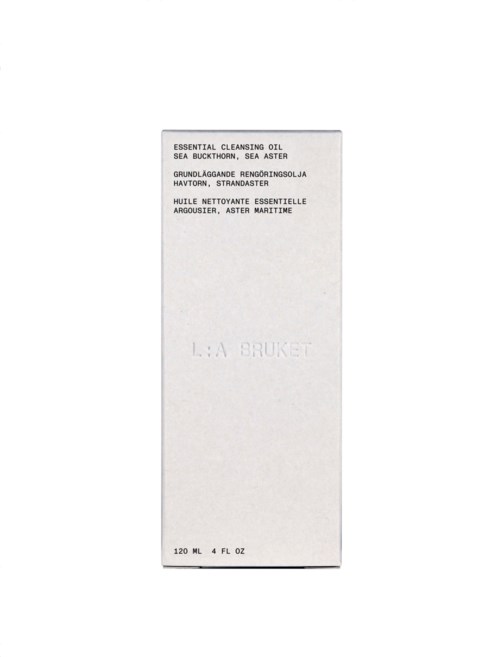 Białe opakowanie z tekstem opisującym olejek oczyszczający i markę, 120 ml pojemności. Prosty i minimalistyczny design.