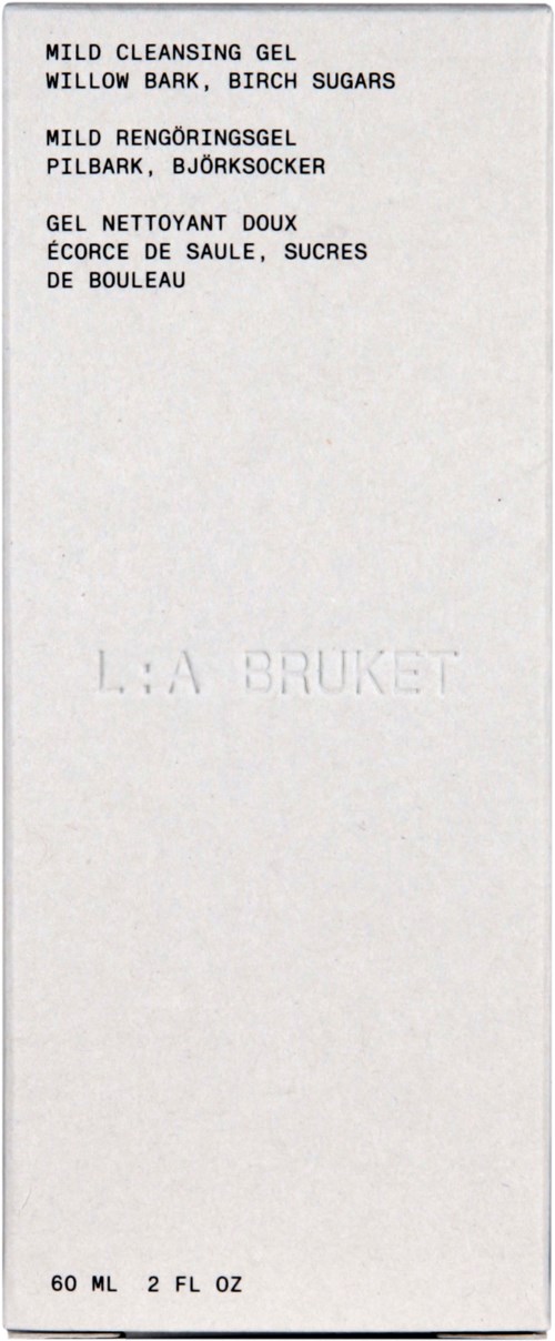 A white box with black text listing a gentle cleansing gel in three languages and the brand name L:A BRUKET.