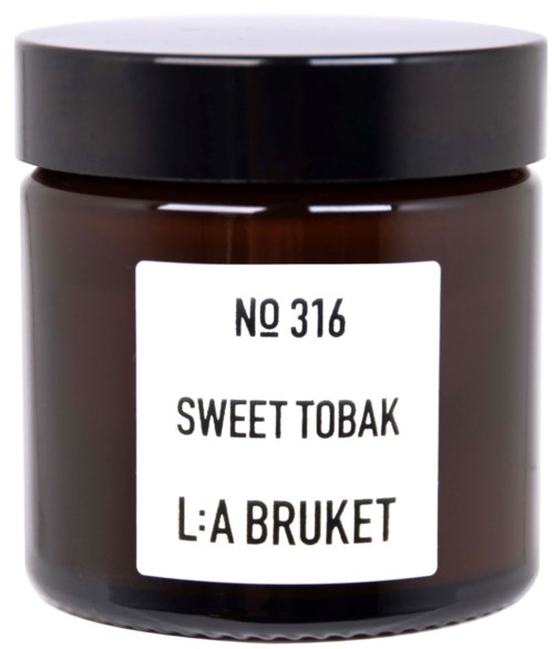 A small brown jar with a black lid, labeled "Sweet Tobak" and "L:A Bruket".