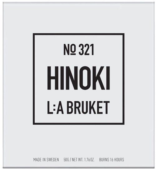 A label with the text "NO 321 HINOKI LA BRUKET" and details about weight, origin, and burning time.