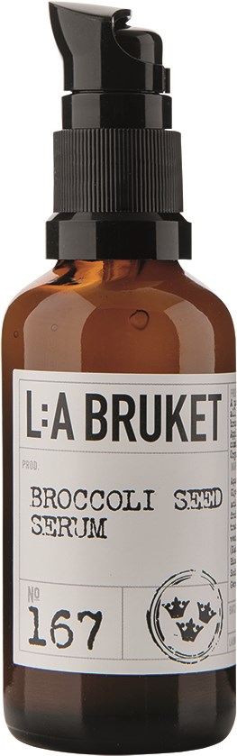 Brun glasflaska med svart pump, märkt 'Broccoli Seed Serum' av L:A Bruket, med produktnummer 167.
