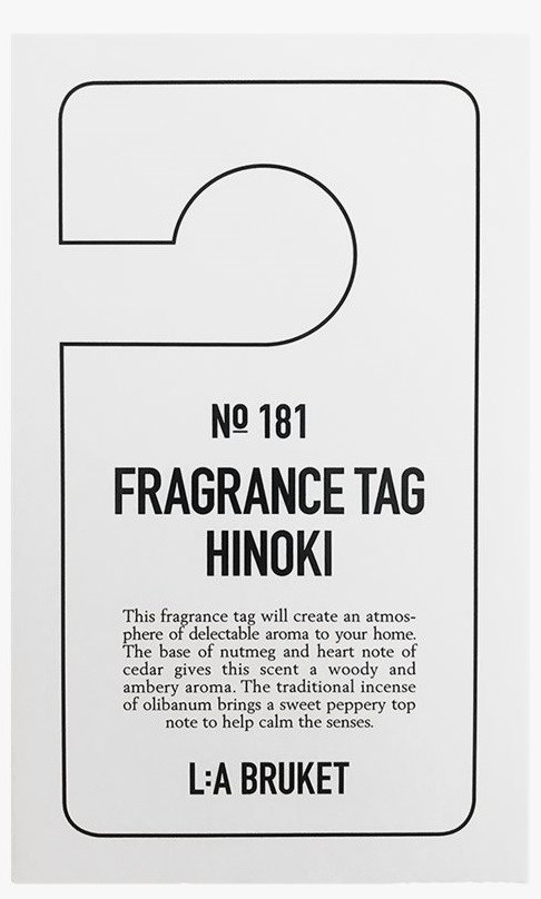 A fragrance tag labeled Hinoki, number 181, with details about scent and aroma, and a note on traditional incense.