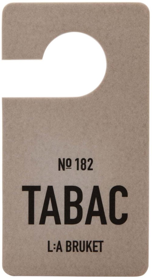 A tag with the word "TABAC" and the number 182, with additional small text below.