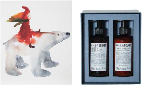 Vandfarveillustration af en person, der rider på en polarbjørn med en papegøje på skulderen, og et gaveæske med kropsvask og lotion.