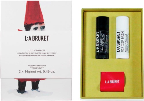 L:A Bruket læbepomade sæt med sorte, hvide og røde beholdere i en gul æske.