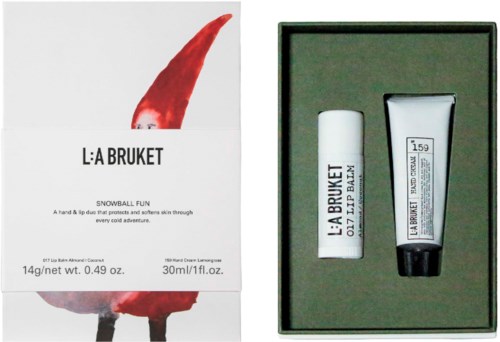 Emballage til L:A Bruket Snowball Fun læbepomade med en hvid stift og en lille tube i en æske.