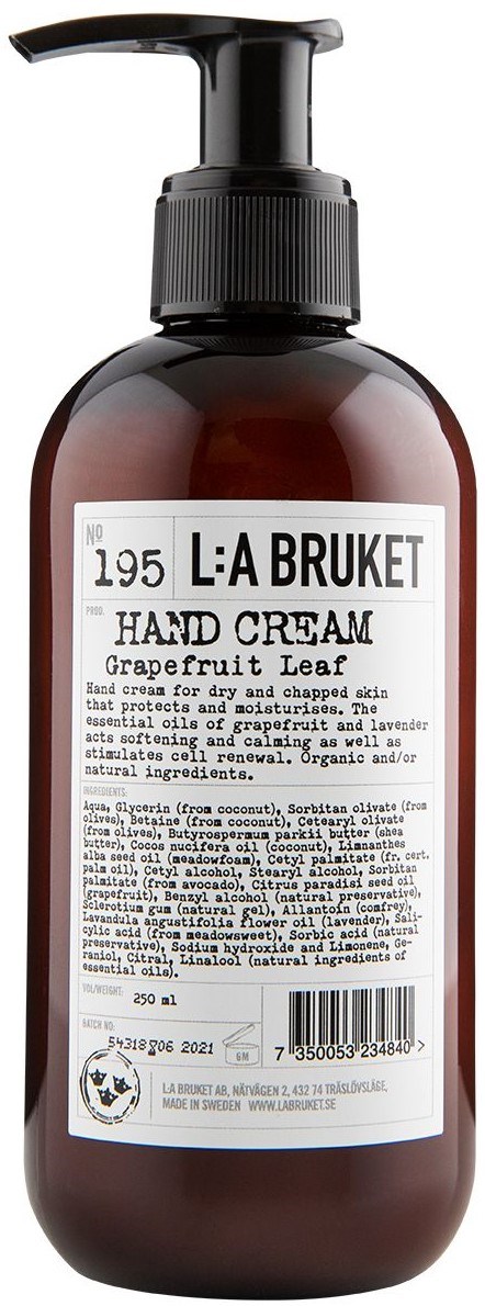 En brunt flaska med pump märkt L:A BRUKET Hand Cream, Grapefruit Leaf, 250 ml.