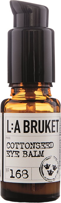 Liten brunt flaska med svart pump, märkt som ögonbalsam av L:A BRUKET, nummer 168, i enkel stil.