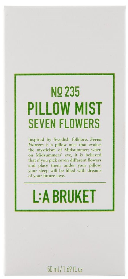 En vit box med grön text om puder mist kallad Seven Flowers, inspirerad av svensk folklore, med märket L:A BRUKET.