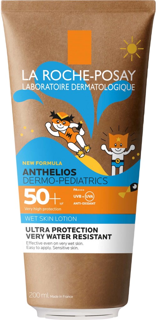 Flaske med La Roche-Posay Anthelios Dermo-Pediatrics solkrem med tegneseriefigurer på etiketten.