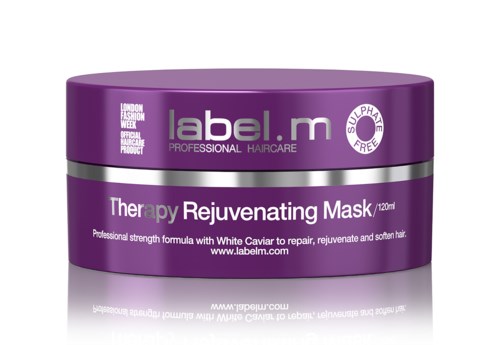 En lila burk med hårmask märkt 'Rejuvenating Mask' från label.m, med information om behandling och ingredienser.