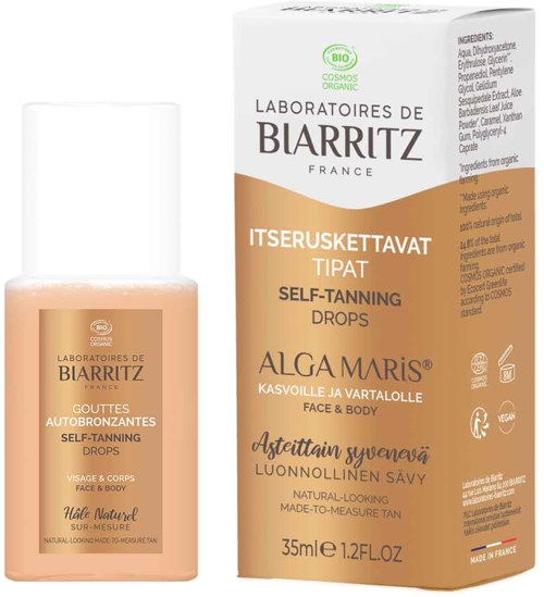 Zelfbruinende drops in fles met gouden label, voor gezicht en lichaam, gemaakt in Frankrijk.