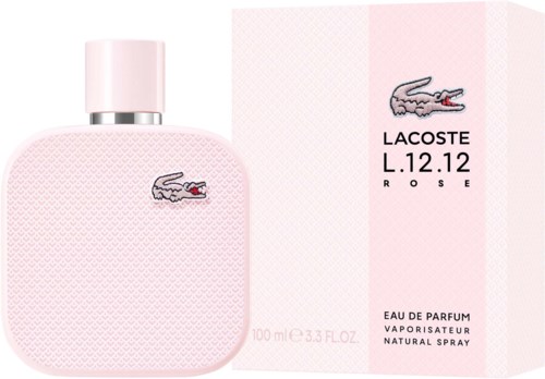 Ljusrosa parfyllflaska med krokodil-logo och matchande box med text och logo i mjuka rosa och vita färger.