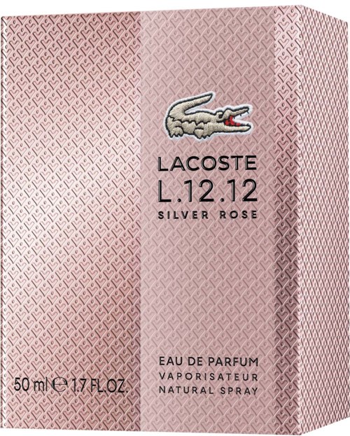 Lacoste parfymbox med krokodyllogo, rosa och grå randig design, och detaljer om storlek och doft.