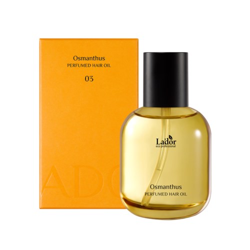 Hajuvesipullo jaoranssinen laatikko, jossa lukee Osmanthus, ja musta korkki, keltainen neste.