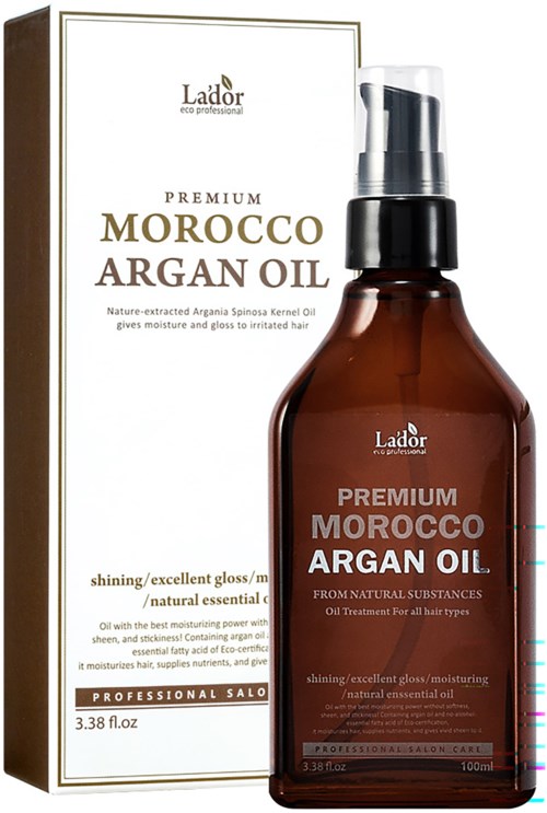 En brun flaska med Morocco Argan Oil med pump, bredvid dess vita förpackningskartong. Båda har textdetaljer.