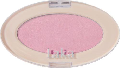 Rosa blush i en oval beholder med klar lokk. Ordet "Laka" er på beholderen.