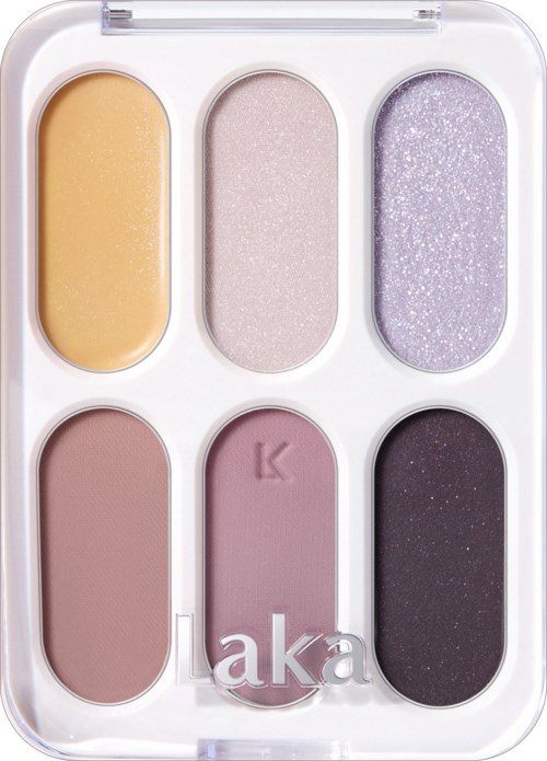 Seks øyenskygger i en palett: gult, lys rosa, lavendel, beige, mauve, mørk lilla.
