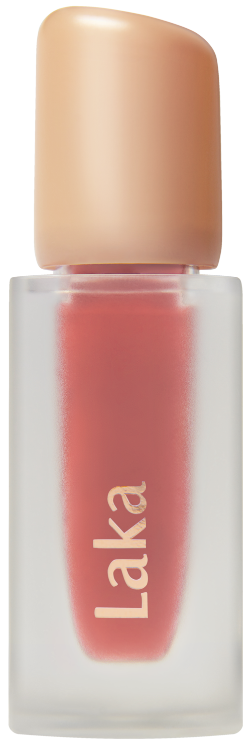 A lip gloss bottle with a beige cap, transparent body, and pink gloss inside with "Laka" written on it.