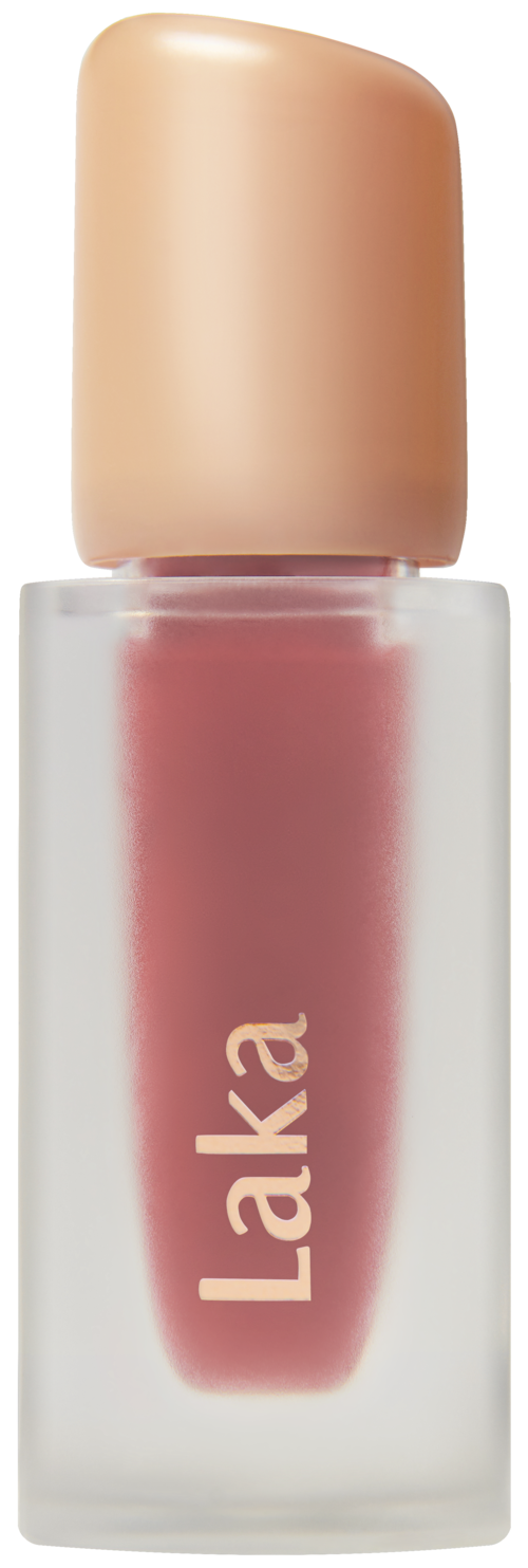 A small lipstick tube with a beige cap and pinkish lipstick inside, labeled "Laka".