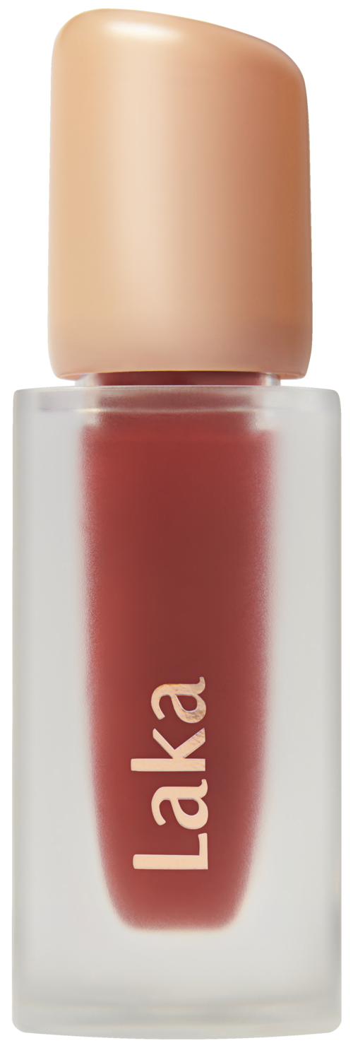 A lip gloss bottle with beige cap and reddish-brown liquid inside. The label says "Laka".