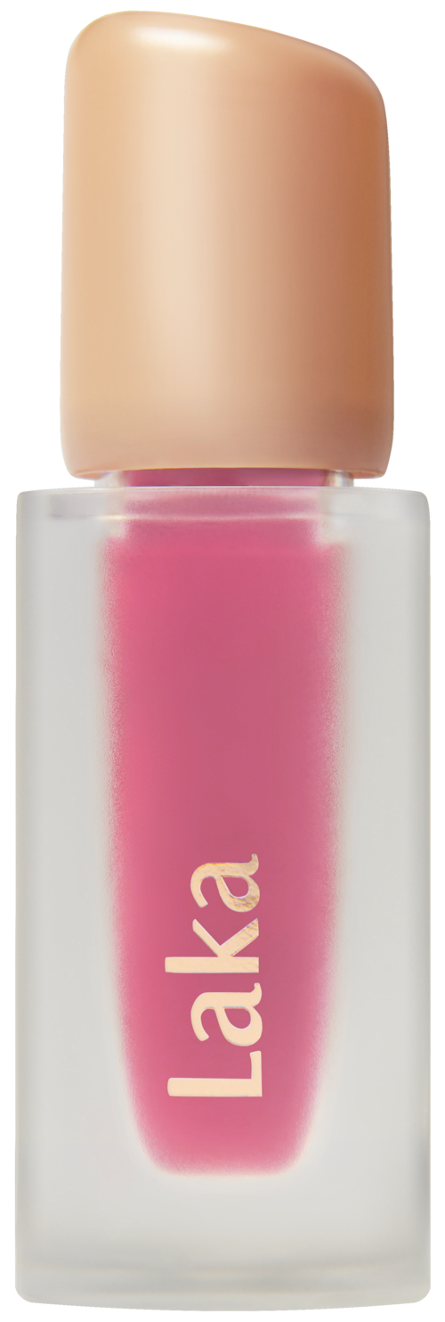 A small bottle of pink nail polish with a beige cap and the word "Laka" on it.