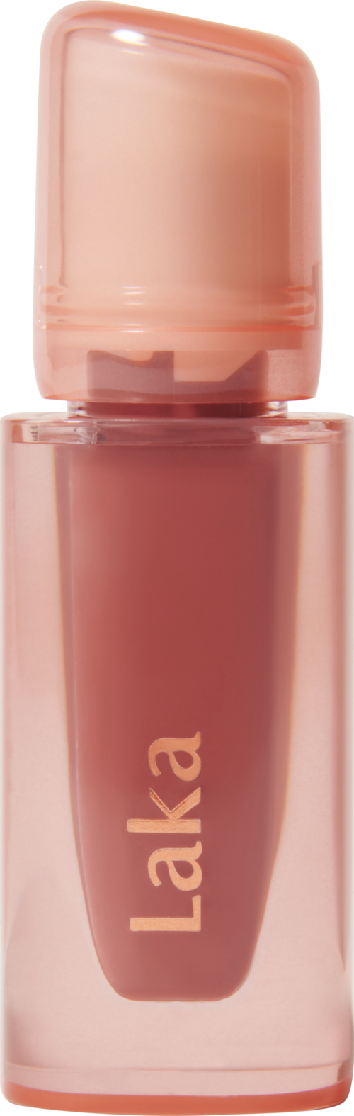 En liten rosa flaske merket 'Laka', sannsynligvis lipgloss eller flytende kosmetikk.