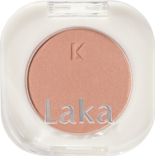 Rosa blush i en hvit rund beholder med klar lokk, merket med 'K' og 'Laka'.
