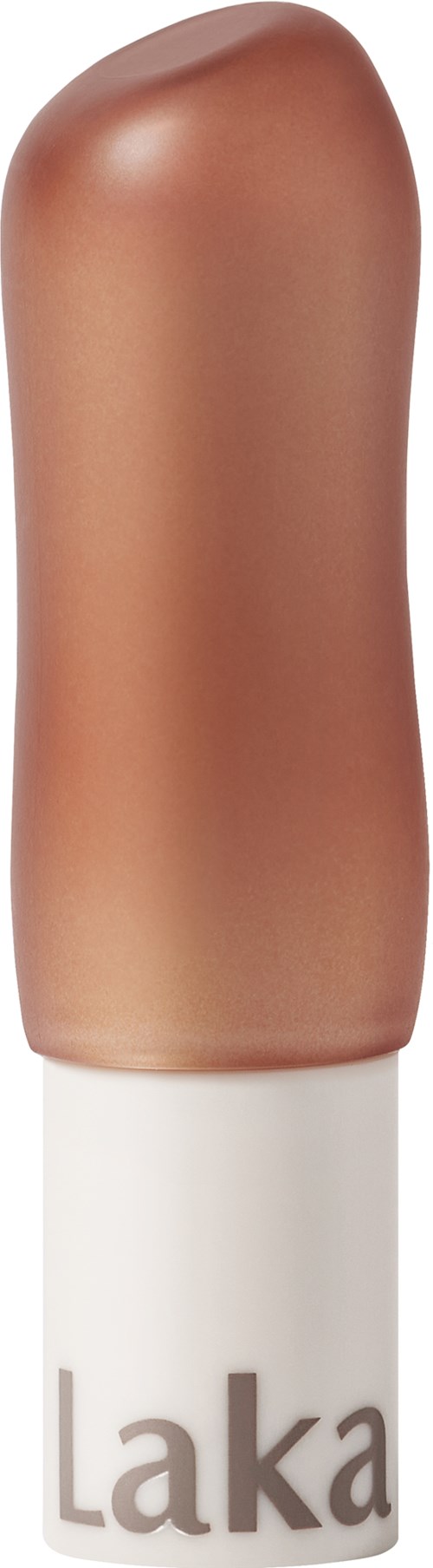 En kosmetikkpind med beige lokk og hvit bunn med "Laka" skrevet på den.